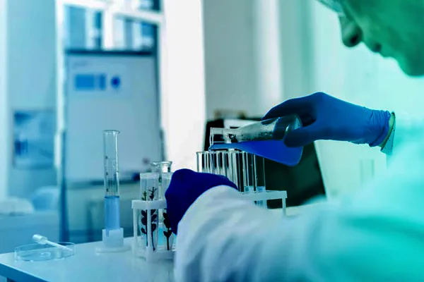 Medical beakers and lab equipment, representing healthcare innovation.